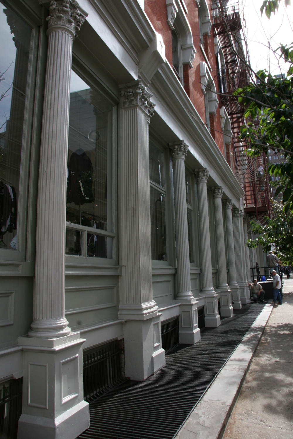 Street view of a renovated building in Manhattan, showcasing Jepol Construction's proficiency in ornamental steel replacement, wood window refurbishment, and metal restoration. Our team's expertise in these areas helps preserve the city's architectural heritage while ensuring structural integrity and aesthetic appeal.