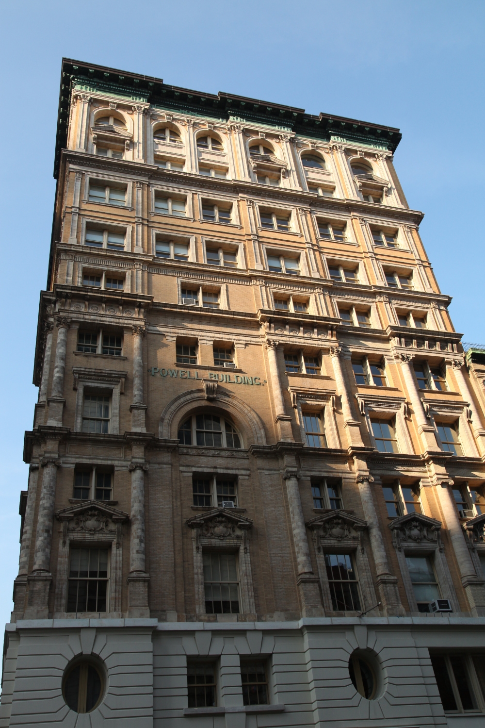 Full view of the Powell Building at 105 Hudson Street in New York City showcasing Jepol Construction's skilled brickwork, stone replacement, and stone restorations.