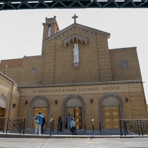Front view of a St. Sebastians RC Church facade restoration project in Woodside, Queens