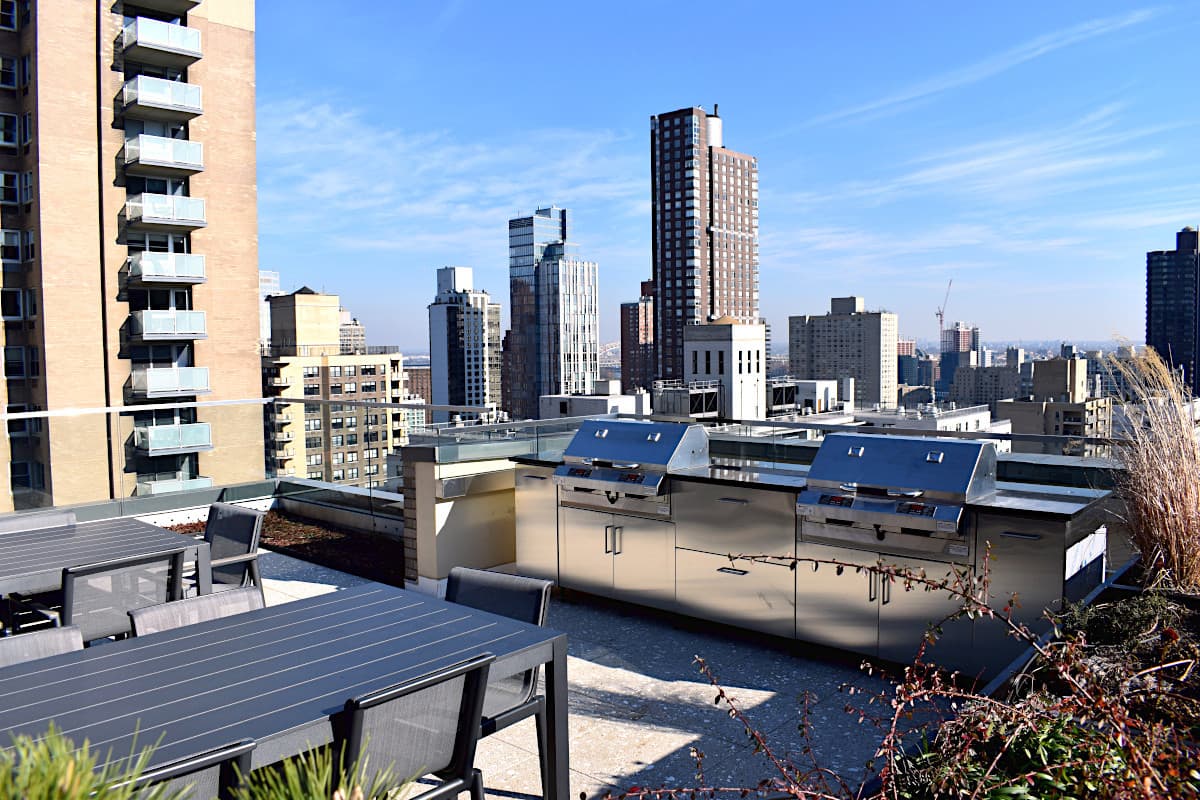 Stainless-steel rooftop grills and storage cabinets