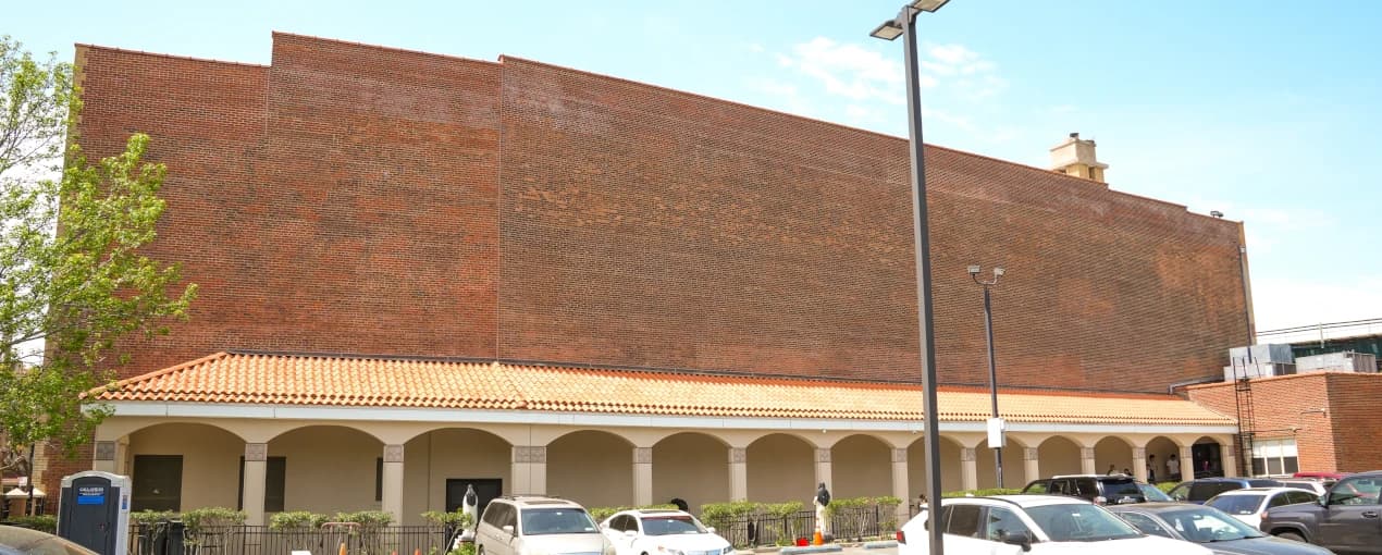 Completed side brick elevation and tiled arcade roof