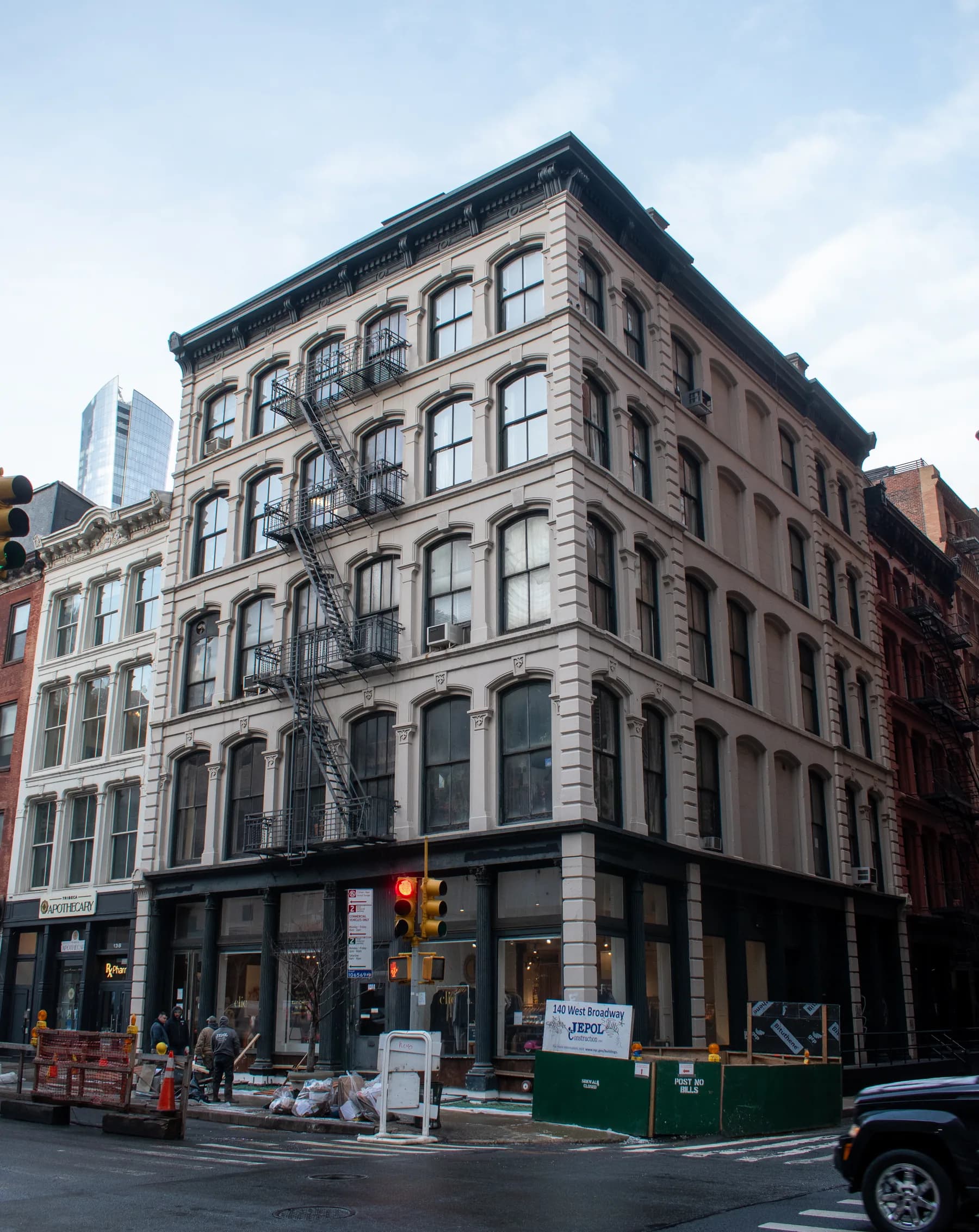 Full street view of the historic commercial building at 140 Broadway
