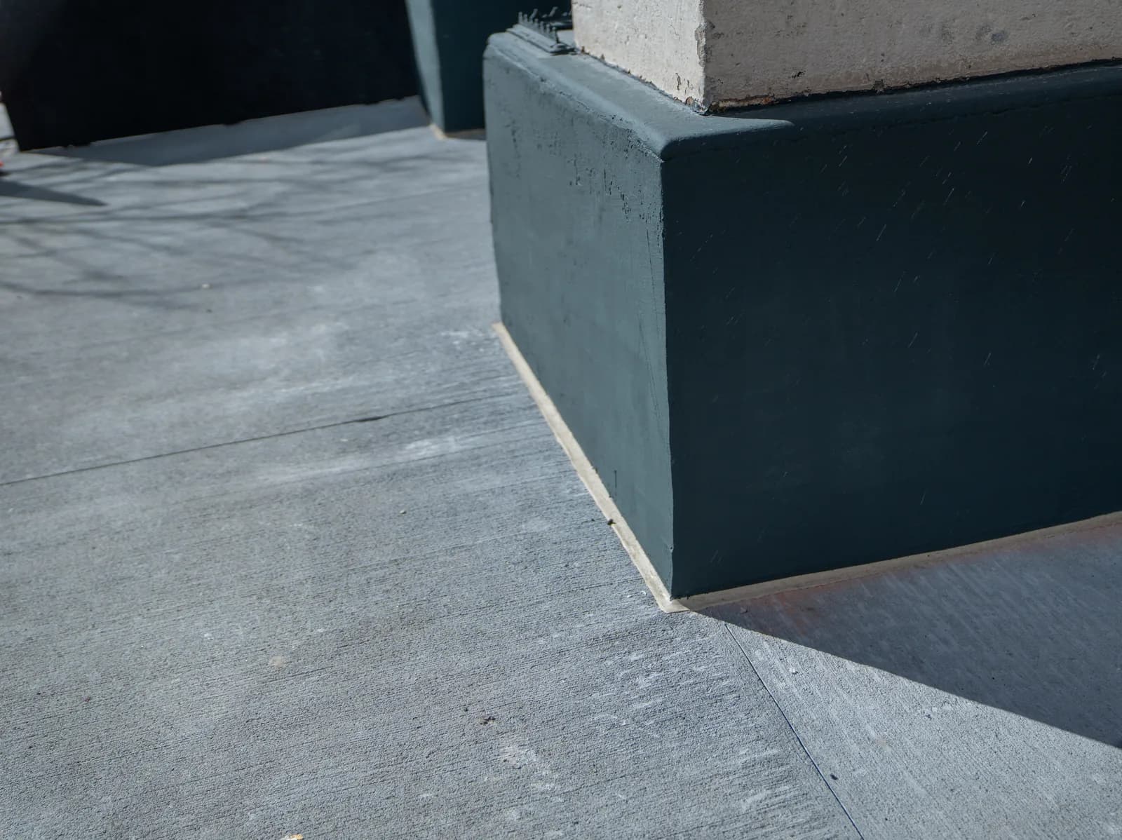 Detailed transition between the accessible ramp and sidewalk at 140 Broadway
