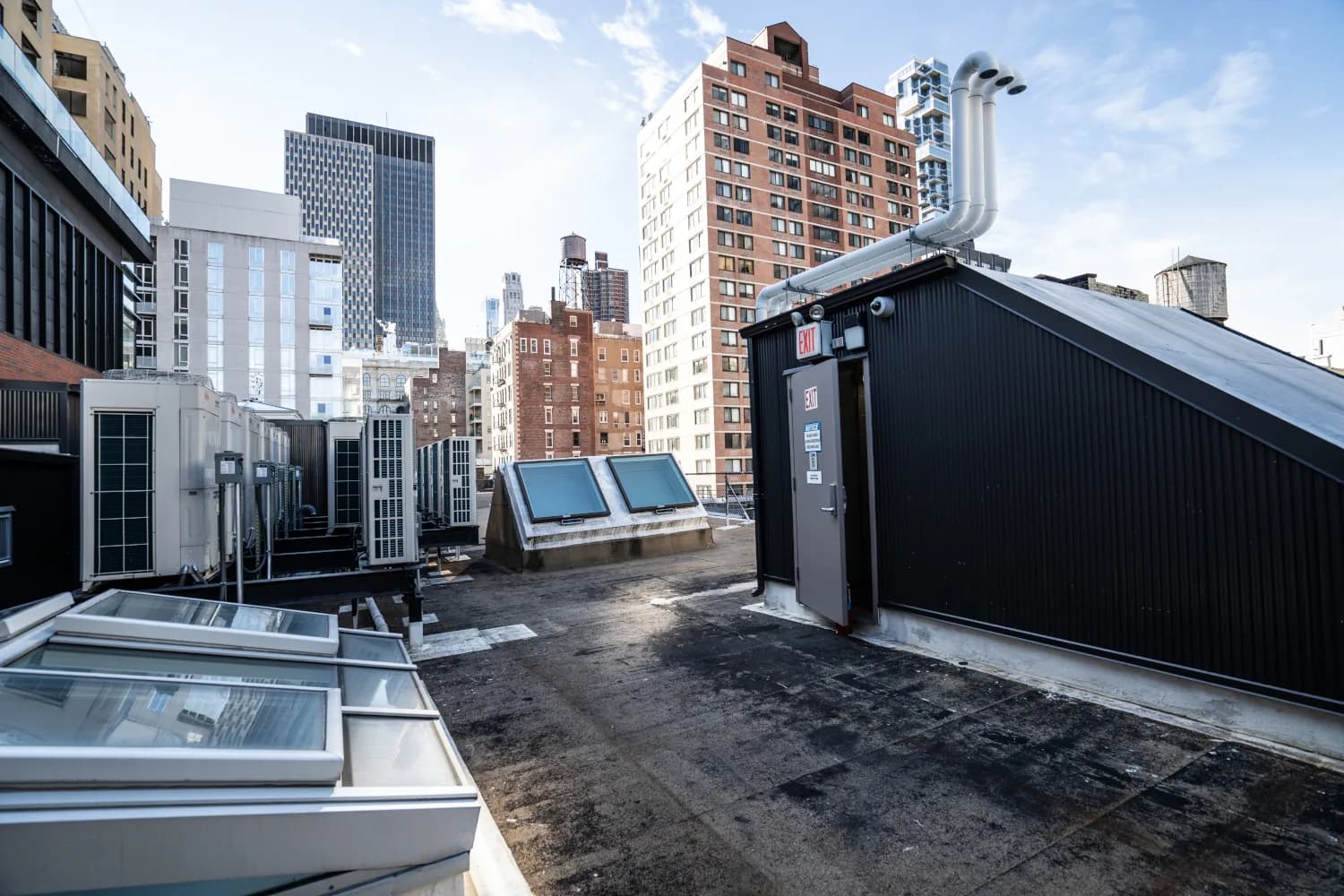 Completed rooftop enclosures, skylights, and mechanical equipment