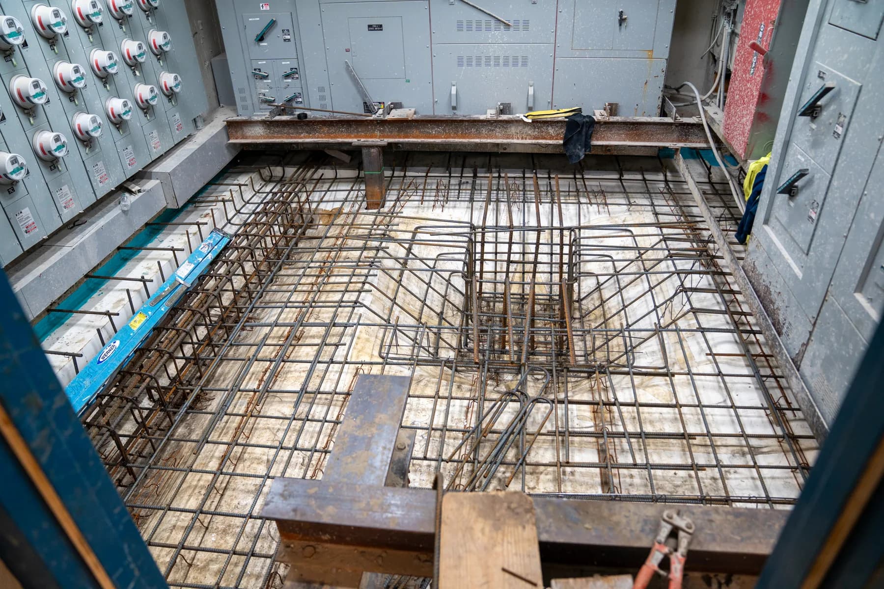 Reinforcing steel prepared for a replacement floor slab at 6469 Broadway