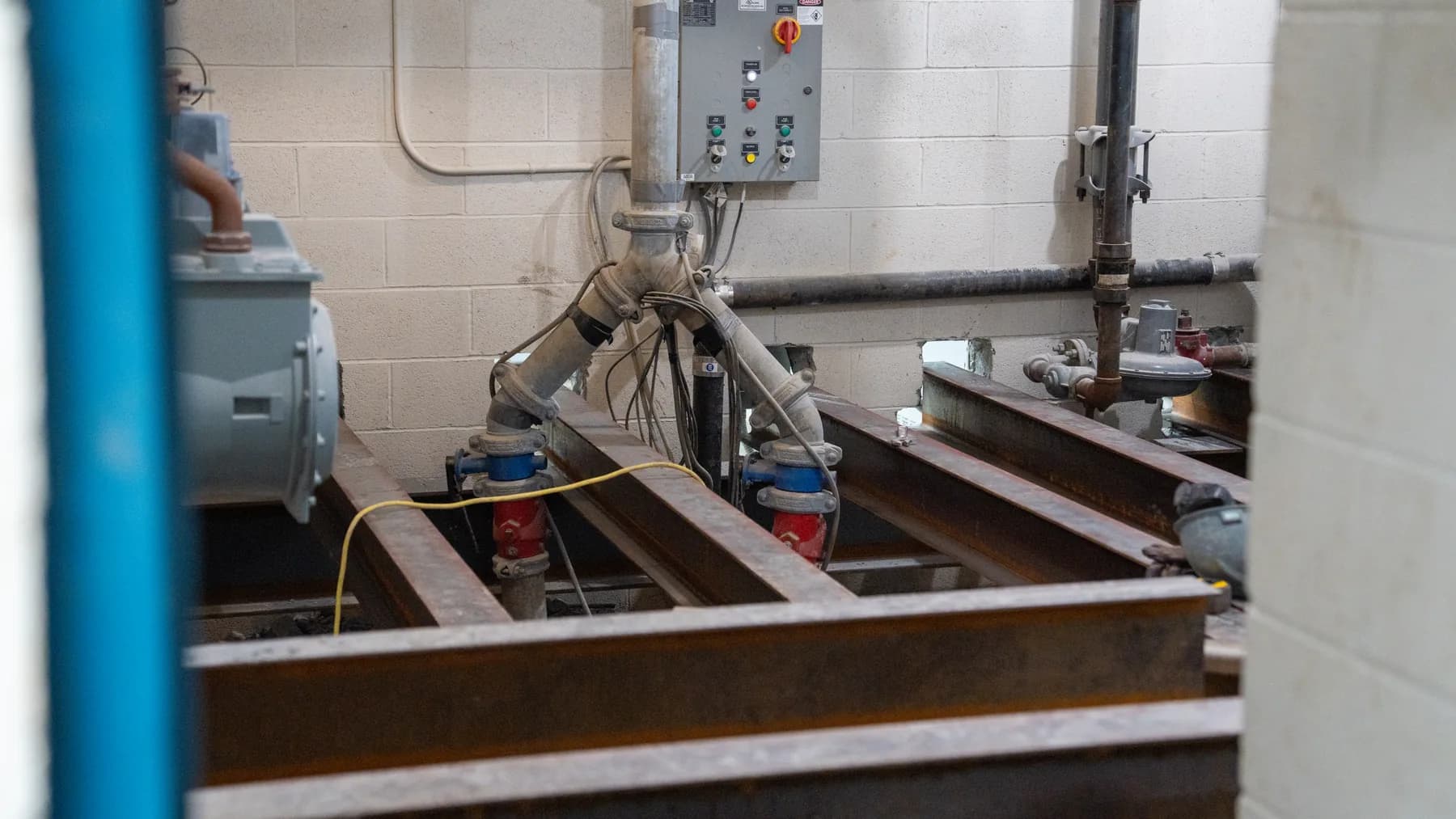 Structural framing coordinated around pipes and equipment in a utility room