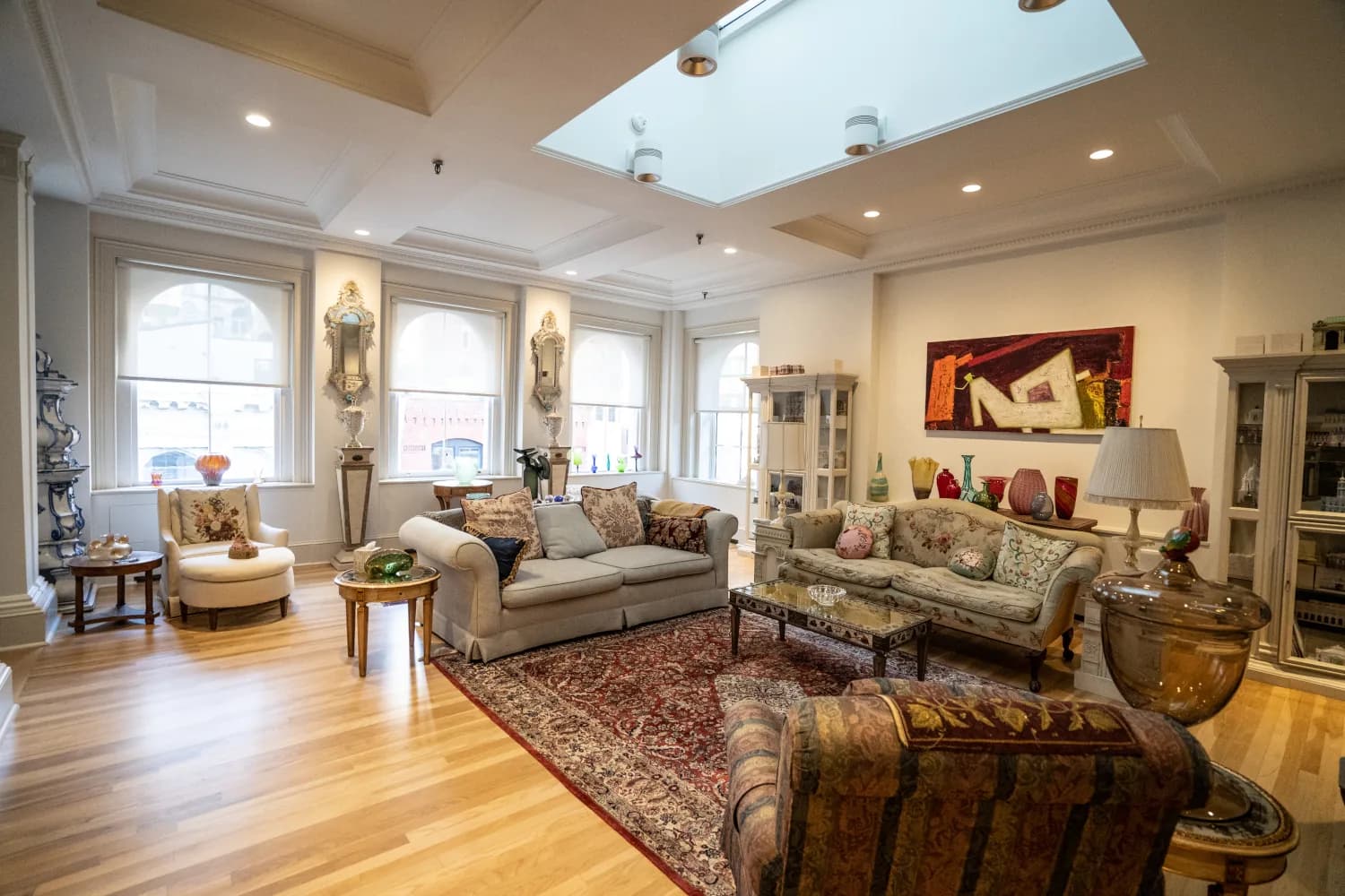 Finished residential interior beneath a large skylight